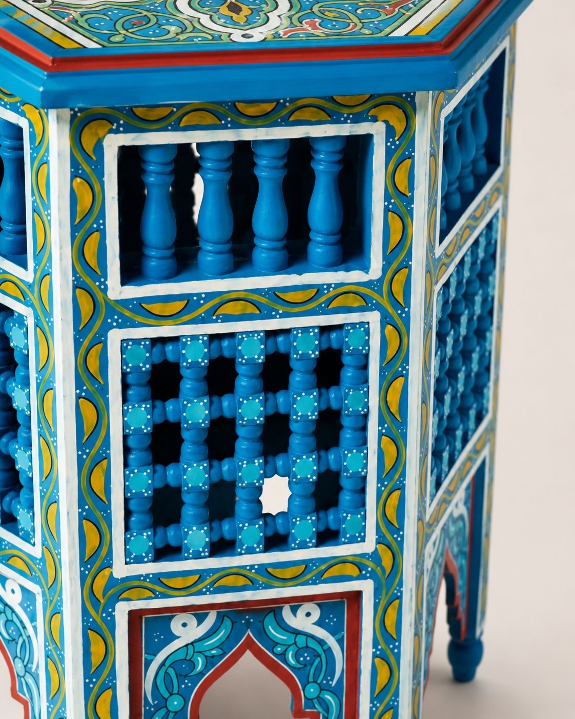 premium Moroccan painted wooden side table close-up of artisan craftsmanship.